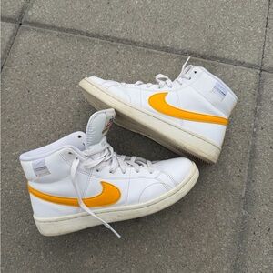 Nike White High-Top Sneakers with Yellow Swoosh